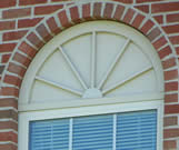 Half round window panel with sunburst